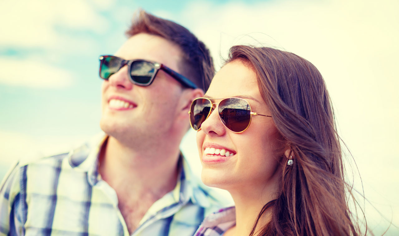 young couple wearing sunglasses